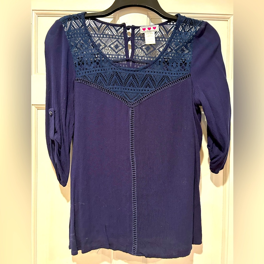 Really cute navy xs blouse with some lace. In excellent condition!